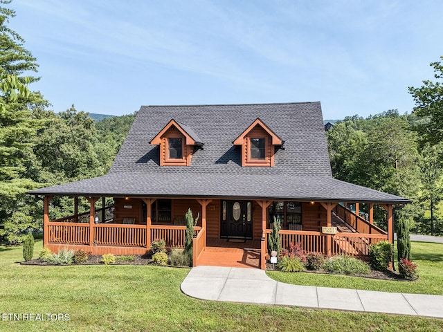 2028 Piney Overlook Ln, Sevierville, TN 37862 - view of front of house with roof with shingles, a front yard, and a porch