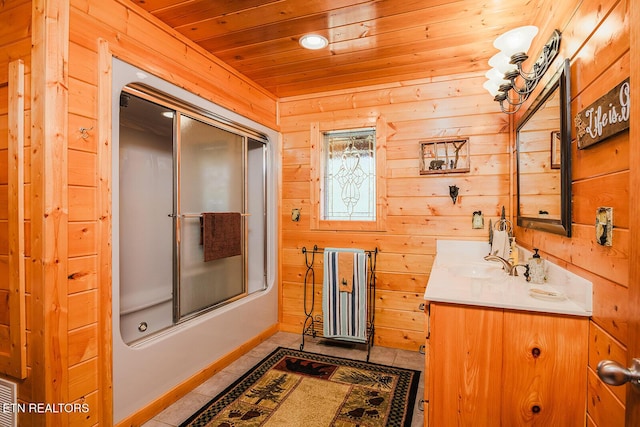 2028 Piney Overlook Ln, Sevierville, TN 37862 - full bath with vanity, wood ceiling, wood walls, enclosed tub / shower combo, and tile patterned floors