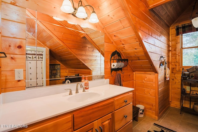 2028 Piney Overlook Ln, Sevierville, TN 37862 - bathroom with lofted ceiling, wooden walls, tile patterned flooring, wood ceiling, and vanity