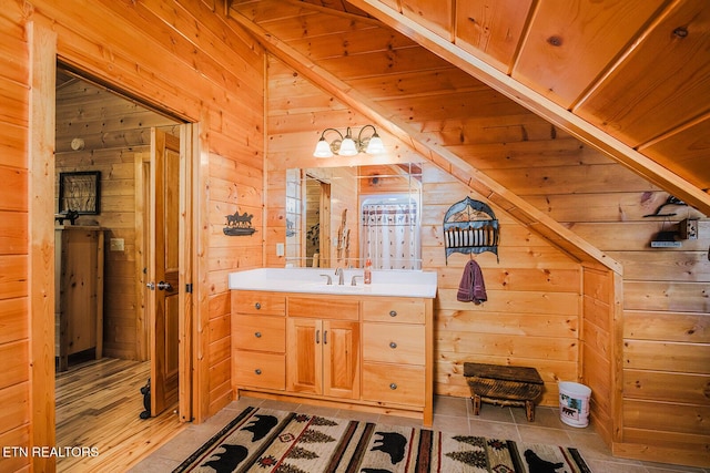 2028 Piney Overlook Ln, Sevierville, TN 37862 - bathroom featuring wooden walls and vanity