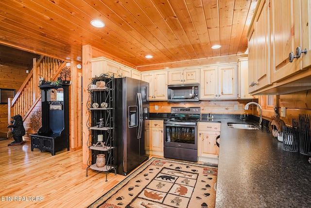 2028 Piney Overlook Ln, Sevierville, TN 37862 - kitchen with appliances with stainless steel finishes, wooden ceiling, dark countertops, recessed lighting, and light wood-style floors