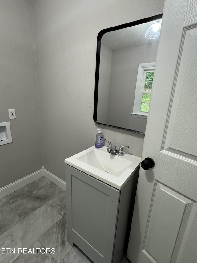 115 Red Oak Ln, New Tazewell, TN 37825 - bathroom with vanity and marble look tiles