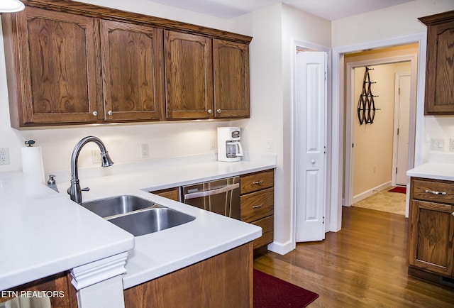 520 Wimberly Rd, Crossville, TN 38558 - kitchen featuring dark wood-style floors, light countertops, and dishwasher