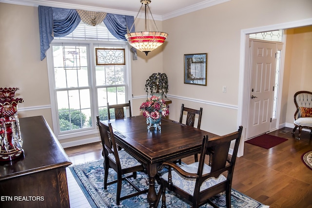 520 Wimberly Rd, Crossville, TN 38558 - dining space featuring dark wood-type flooring, healthy amount of natural light, and crown molding