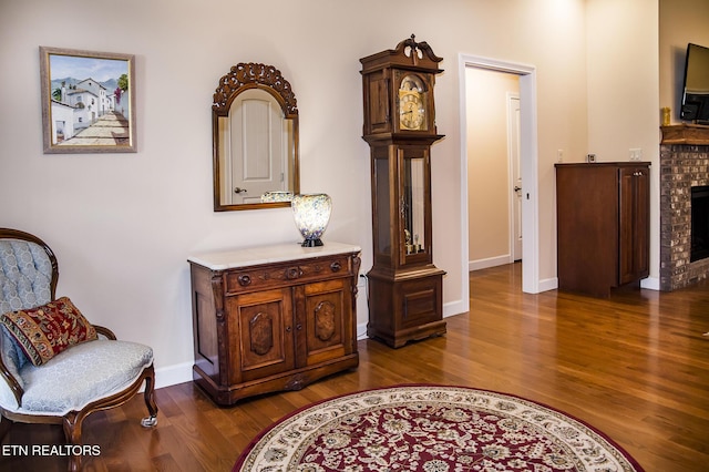 520 Wimberly Rd, Crossville, TN 38558 - sitting room featuring dark wood-style floors and a fireplace