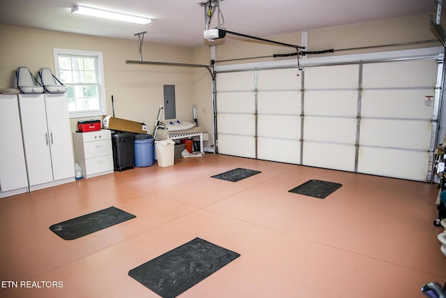 520 Wimberly Rd, Crossville, TN 38558 - garage with a garage door opener and electric panel