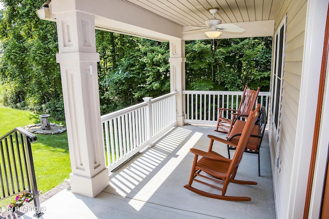 520 Wimberly Rd, Crossville, TN 38558 - porch with ceiling fan and a lawn