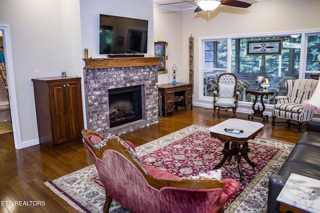 520 Wimberly Rd, Crossville, TN 38558 - living area featuring ceiling fan, dark wood-type flooring, and a fireplace