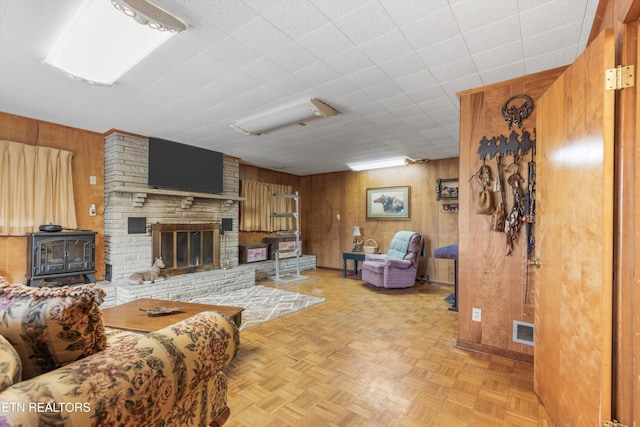 1175 Cardnal Cv, Rutledge, TN 37861 - living area featuring wood walls and a fireplace