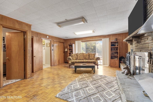 1175 Cardnal Cv, Rutledge, TN 37861 - living room with wooden walls and a stone fireplace