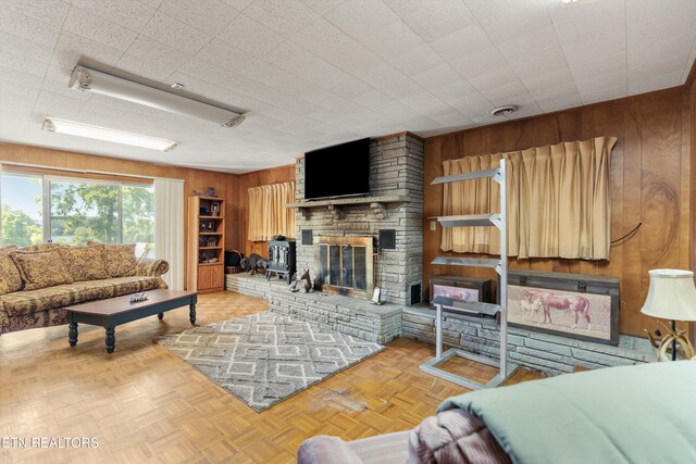 1175 Cardnal Cv, Rutledge, TN 37861 - living area with wooden walls and a fireplace