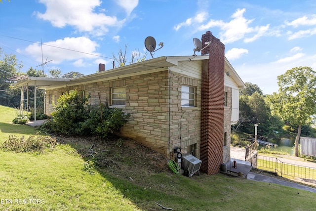 1175 Cardnal Cv, Rutledge, TN 37861 - view of property exterior with a chimney and stone siding