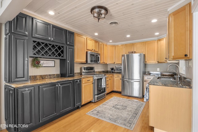 1536 Old Chisholm Trl, Dandridge, TN 37725 - kitchen with appliances with stainless steel finishes, light wood finished floors, wooden ceiling, recessed lighting, and dark stone counters