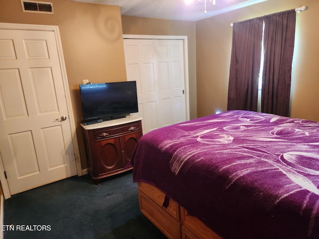 5412 E Lamar Alex Pkwy, Walland, TN 37886 - bedroom with dark carpet and a closet