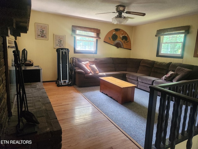 5412 E Lamar Alex Pkwy, Walland, TN 37886 - living room with plenty of natural light, a ceiling fan, wood finished floors, and a textured ceiling