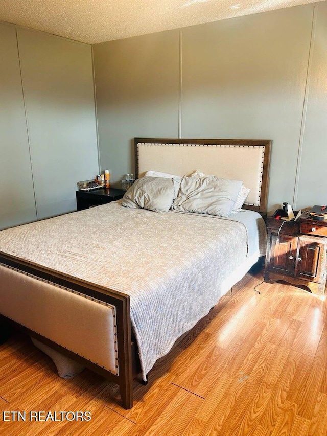 181 Claude Hargis Ln, Crawford, TN 38554 - bedroom with light wood finished floors