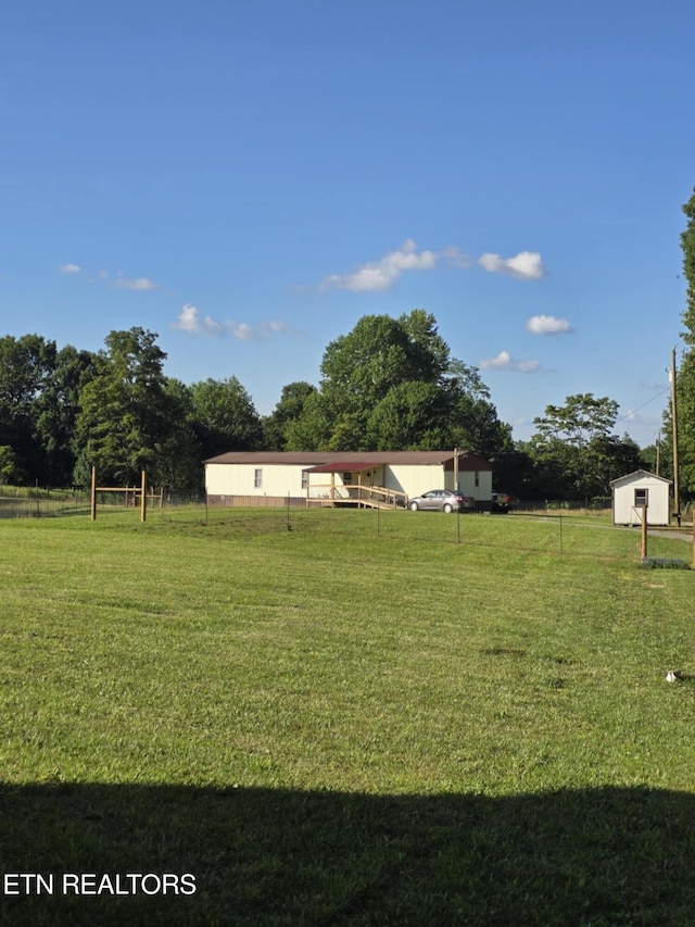 181 Claude Hargis Ln, Crawford, TN 38554 - view of yard with a storage shed