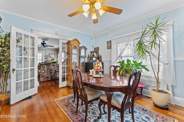 313 Locust St, Englewood, TN 37329 - dining space featuring ceiling fan, french doors, plenty of natural light, wood finished floors, and crown molding