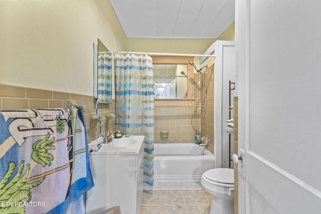 313 Locust St, Englewood, TN 37329 - bathroom with tile patterned flooring, shower / tub combo with curtain, vanity, and tile walls