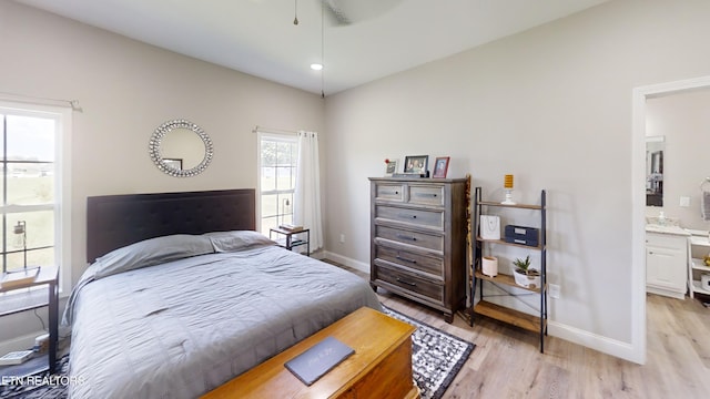 101 Maca Ridge Cir, Clarkrange, TN 38553 - bedroom featuring light wood finished floors and ensuite bathroom