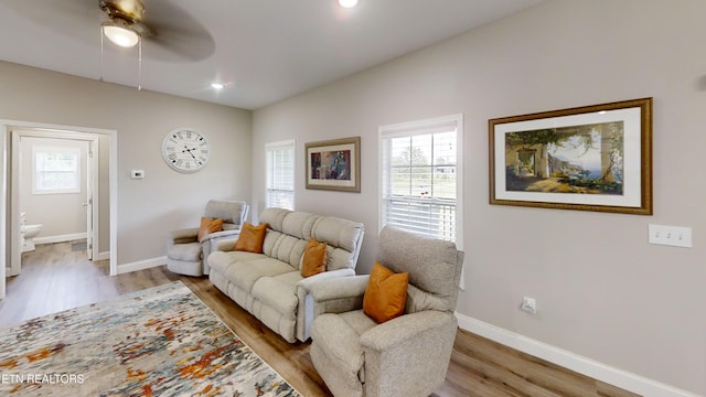 101 Maca Ridge Cir, Clarkrange, TN 38553 - living area with wood finished floors, plenty of natural light, ceiling fan, and recessed lighting