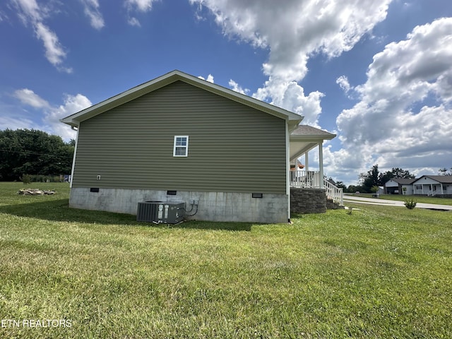 101 Maca Ridge Cir, Clarkrange, TN 38553 - view of home's exterior with crawl space, covered porch, and a yard