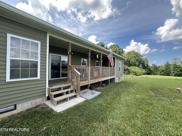101 Maca Ridge Cir, Clarkrange, TN 38553 - view of green lawn featuring a wooden deck