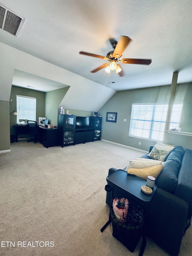 13001 Sanderling Ln, Knoxville, TN 37922 - living room featuring vaulted ceiling, carpet floors, ceiling fan, an office area, and a textured ceiling