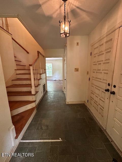 259 Watson Ln, Middlesboro, KY 40965 - foyer entrance featuring stairs and baseboards
