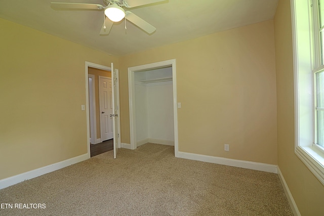 22453 Alberta St, Oneida, TN 37841 - unfurnished bedroom with carpet, a closet, and ceiling fan