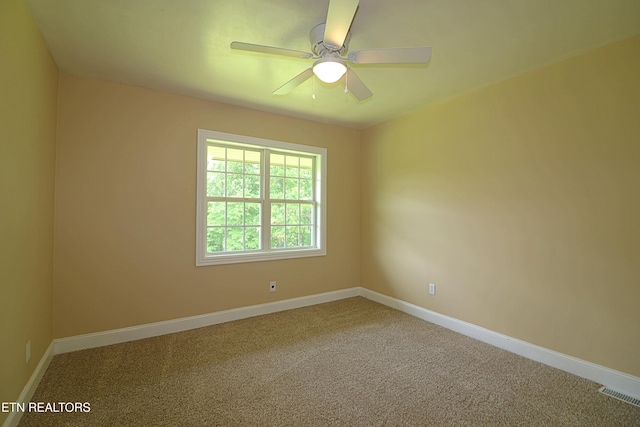 22453 Alberta St, Oneida, TN 37841 - carpeted spare room featuring baseboards and ceiling fan