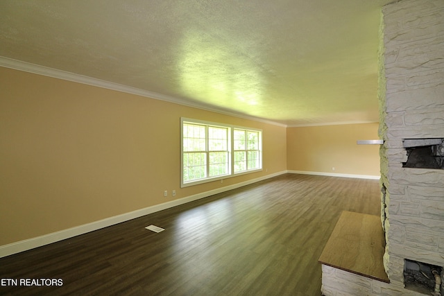22453 Alberta St, Oneida, TN 37841 - unfurnished living room with a fireplace, crown molding, and dark wood finished floors