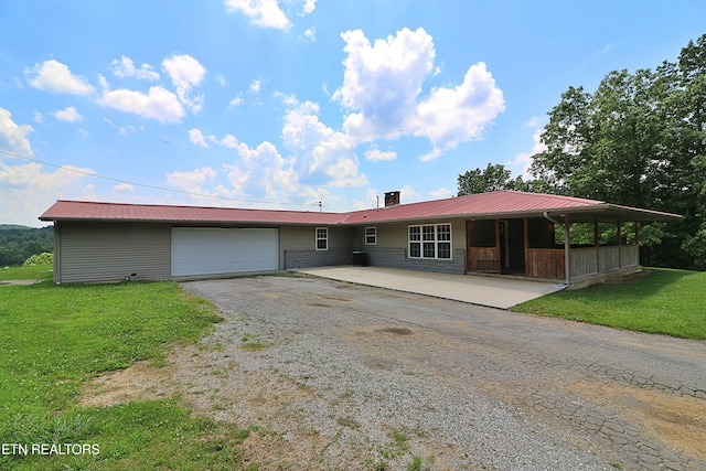 22453 Alberta St, Oneida, TN 37841 - ranch-style house with a garage, a front lawn, a metal roof, and a chimney