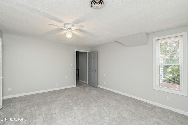 2115 Aaron Ct, Sevierville, TN 37876 - spare room featuring a ceiling fan, a textured ceiling, and carpet floors