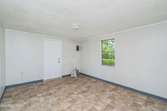 2115 Aaron Ct, Sevierville, TN 37876 - empty room featuring crown molding and a textured ceiling