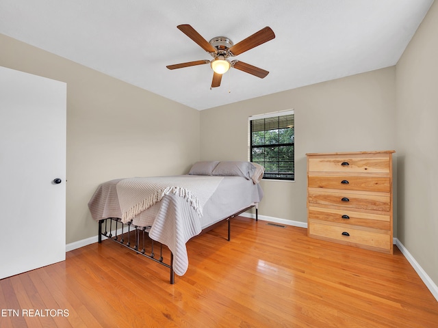 1371 Elijah Martin Rd, Whitesburg, TN 37891 - bedroom with light wood-style floors and ceiling fan