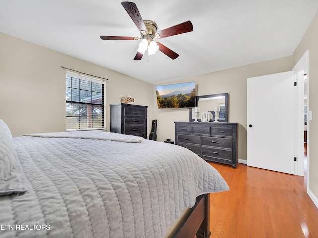 1371 Elijah Martin Rd, Whitesburg, TN 37891 - bedroom featuring light wood-style flooring and a ceiling fan