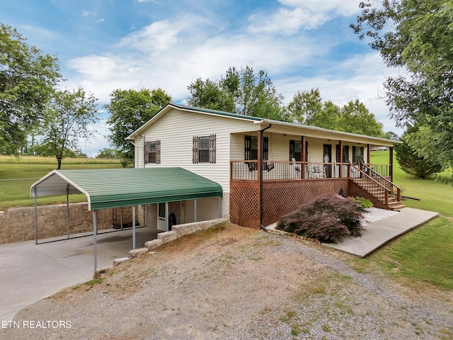 1371 Elijah Martin Rd, Whitesburg, TN 37891 - ranch-style home with concrete driveway, a porch, a carport, and stairs