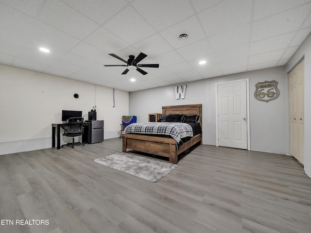 1371 Elijah Martin Rd, Whitesburg, TN 37891 - bedroom featuring a desk, wood finished floors, ceiling fan, a paneled ceiling, and recessed lighting