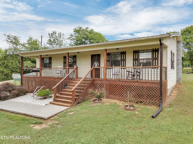 1371 Elijah Martin Rd, Whitesburg, TN 37891 - ranch-style house featuring a porch and a front yard