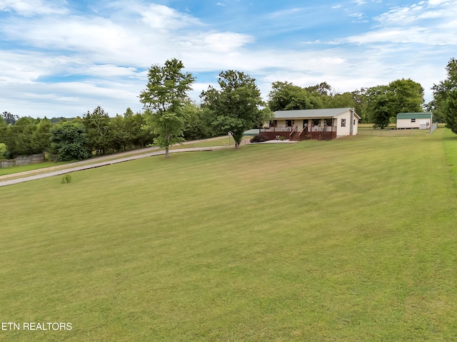 1371 Elijah Martin Rd, Whitesburg, TN 37891 - view of green lawn with a porch