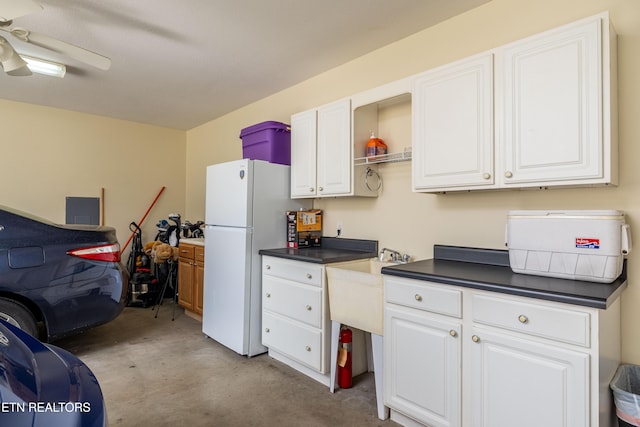 1903 Star Dust Way, Walland, TN 37886 - kitchen featuring freestanding refrigerator, concrete floors, dark countertops, and electric panel