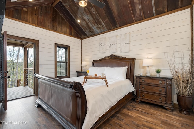 1023 Timberlake Cir, Sevierville, TN 37876 - bedroom featuring lofted ceiling, access to outside, dark wood-style flooring, and wooden walls