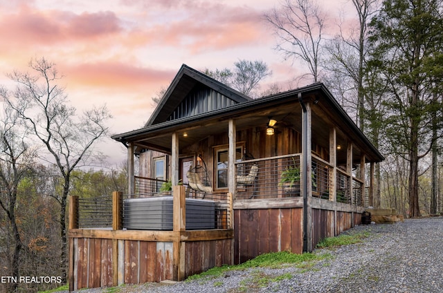 1023 Timberlake Cir, Sevierville, TN 37876 - view of front of house featuring covered porch and board and batten siding