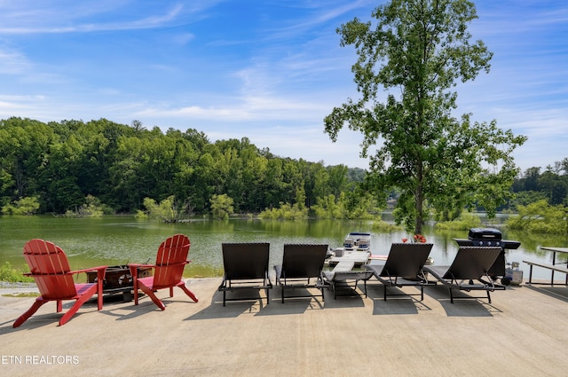 1023 Timberlake Cir, Sevierville, TN 37876 - view of patio / terrace with a water view, a forest view, and a grill