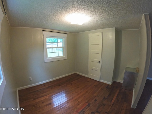 9 Sharp Rd, Athens, TN 37303 - empty room with dark wood-style flooring and a textured ceiling
