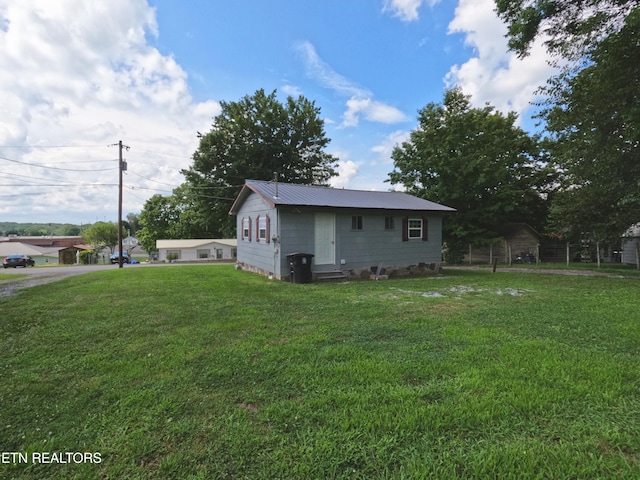 9 Sharp Rd, Athens, TN 37303 - view of front facade with a front lawn and a metal roof
