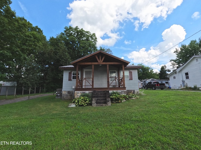 9 Sharp Rd, Athens, TN 37303 - bungalow with covered porch and a front lawn
