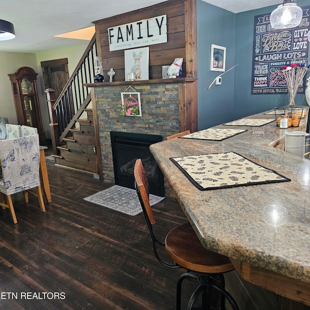 1100 Mill Branch Rd, Huntsville, TN 37756 - dining area with wood finished floors, stairway, and a fireplace