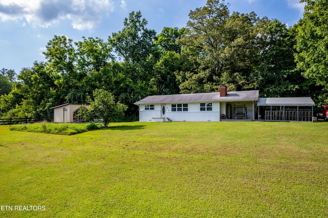 816 Thorn Grove Pike, Strawberry Plains, TN 37871 - view of front of house featuring a chimney, a shed, and a sunroom
